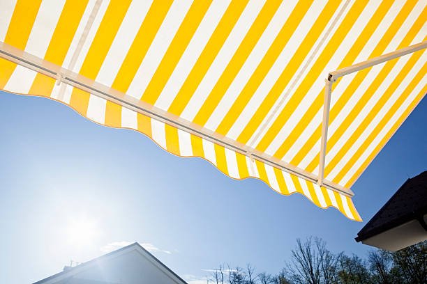 yellow white stripped awning. canon 5d mk ii.